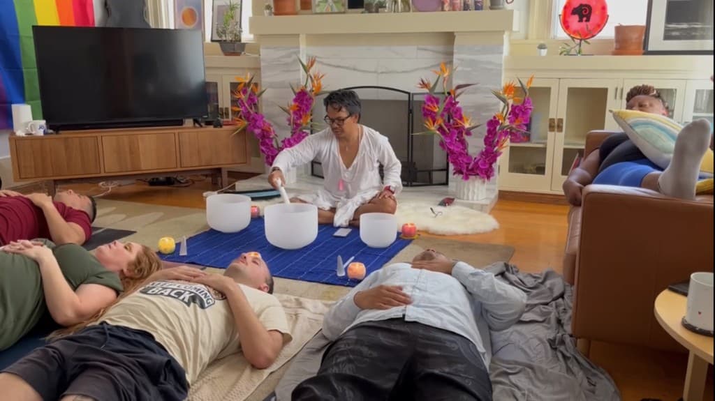 Nakhone Keodara leading a group sound bath in Los Angeles